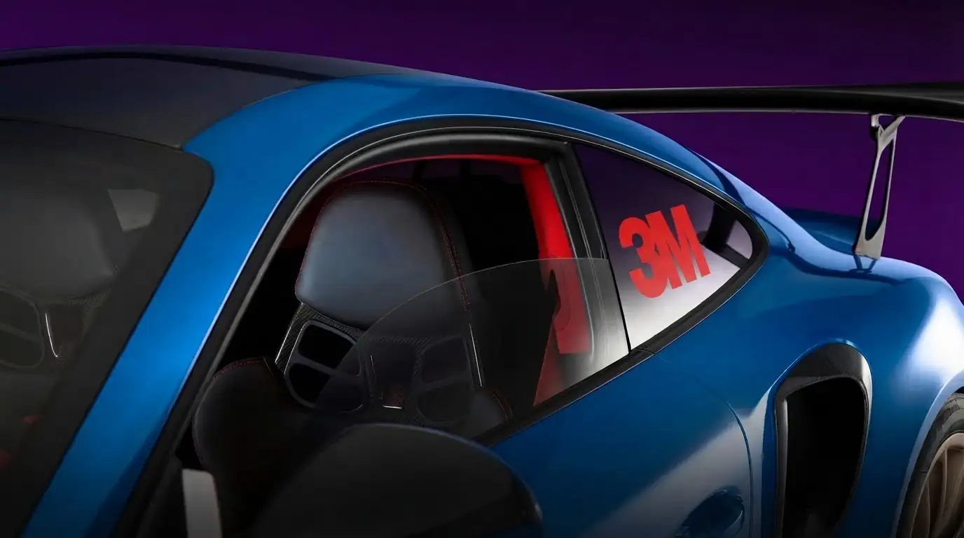 Blue sports car with 3M window film on the rear side window